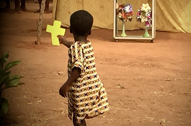 small child with cross